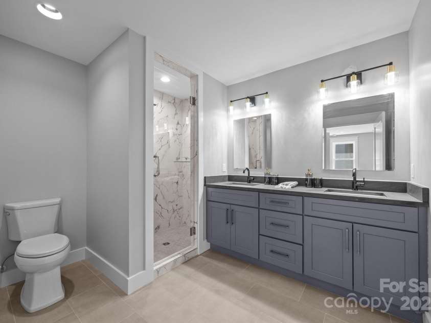 89 Glendale Avenue, Asheville, NC 28803.  MLS# CAR4160954, YatesRealty ID 631. Primary bath with double vanities