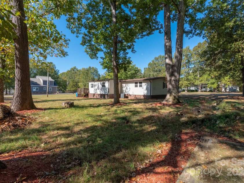 4108 Scarlet Street, Matthews, NC 28104.  MLS# CAR4194045, YatesRealty ID 6316. Beautilful half acre lot