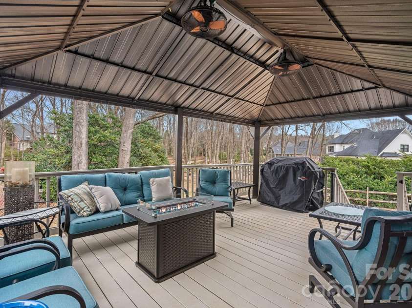 12415 Darby Chase Drive, Charlotte, NC 28277.  MLS# CAR4330433, YatesRealty ID 6321. Large deck with pergola