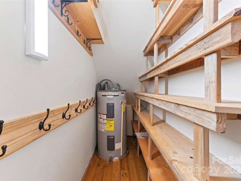 2720 Lentz Road, China Grove, NC 28023.  MLS# CAR4190488, YatesRealty ID 6325. This large closet is downstairs near the family room and kitchen,  perfect for an extra pantry or extra storage space