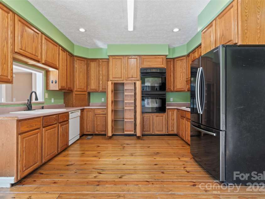 2720 Lentz Road, China Grove, NC 28023.  MLS# CAR4309058, YatesRealty ID 6325. Check out the pantry the opens up with multiple doors and has tons of space!