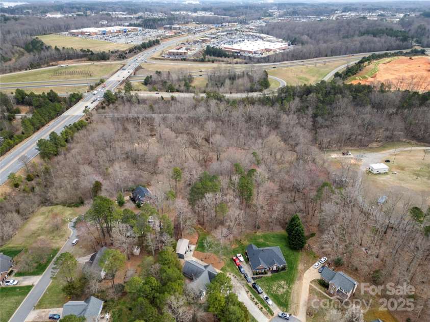 7219 Morningdew Court, Denver, NC 28037.  MLS# CAR4233795, YatesRealty ID 6333. Aerial to show how close to Walmart, Lowes and other shopping