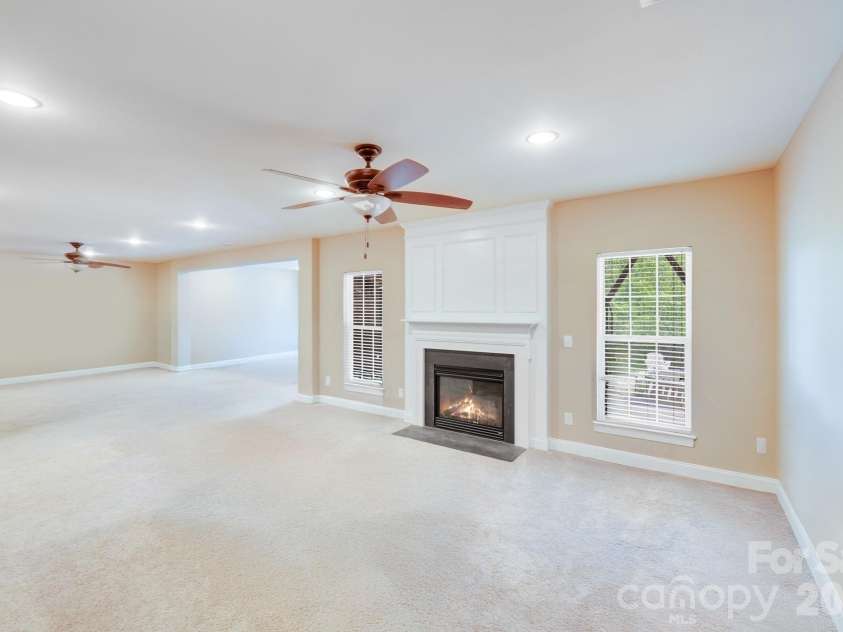 9433 Stonebridge Way, Mint Hill, NC 28227.  MLS# CAR4352110, YatesRealty ID 6333. Basement Fireplace