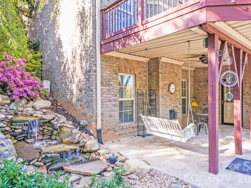9433 Stonebridge Way, Mint Hill, NC 28227.  MLS# CAR4352110, YatesRealty ID 6333. Basement level porch underneath the deck