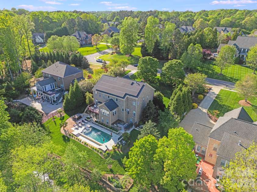 9433 Stonebridge Way, Mint Hill, NC 28227.  MLS# CAR4352110, YatesRealty ID 6333. Drone from above the Lake