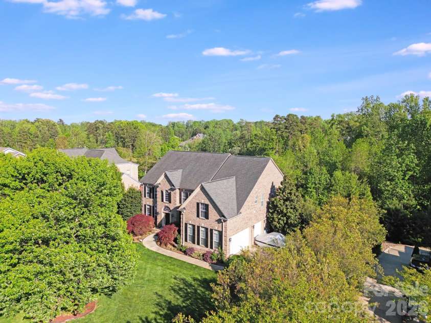 9433 Stonebridge Way, Mint Hill, NC 28227.  MLS# CAR4352110, YatesRealty ID 6333. Drone - From Street in front of home