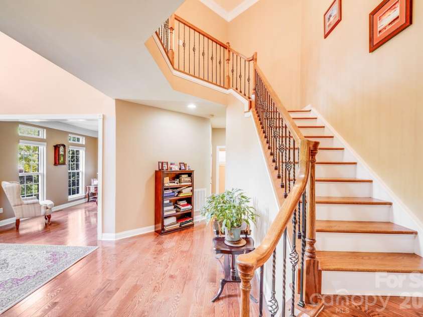 9433 Stonebridge Way, Mint Hill, NC 28227.  MLS# CAR4352110, YatesRealty ID 6333. Main Floor Stairway