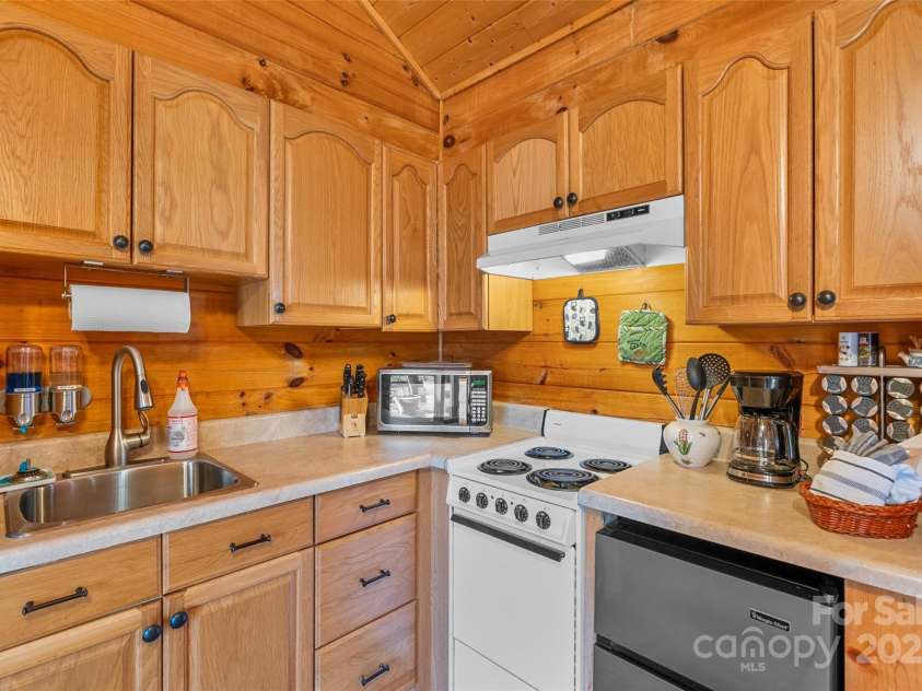 393 Seton Road, Lake Lure, NC 28746.  MLS# CAR4241486, YatesRealty ID 6339. 