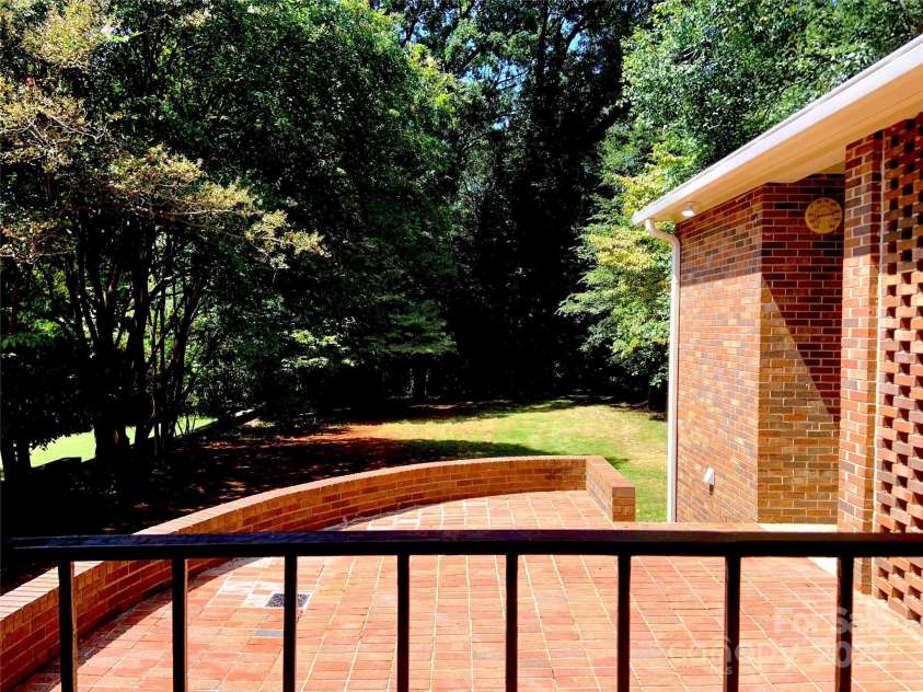 211 Worthington Street, Shelby, NC 28150.  MLS# CAR4243112, YatesRealty ID 6346. Rear Entry at Carport Overlooking Patio