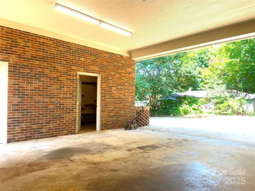 211 Worthington Street, Shelby, NC 28150.  MLS# CAR4243112, YatesRealty ID 6346. Spacious Carport!