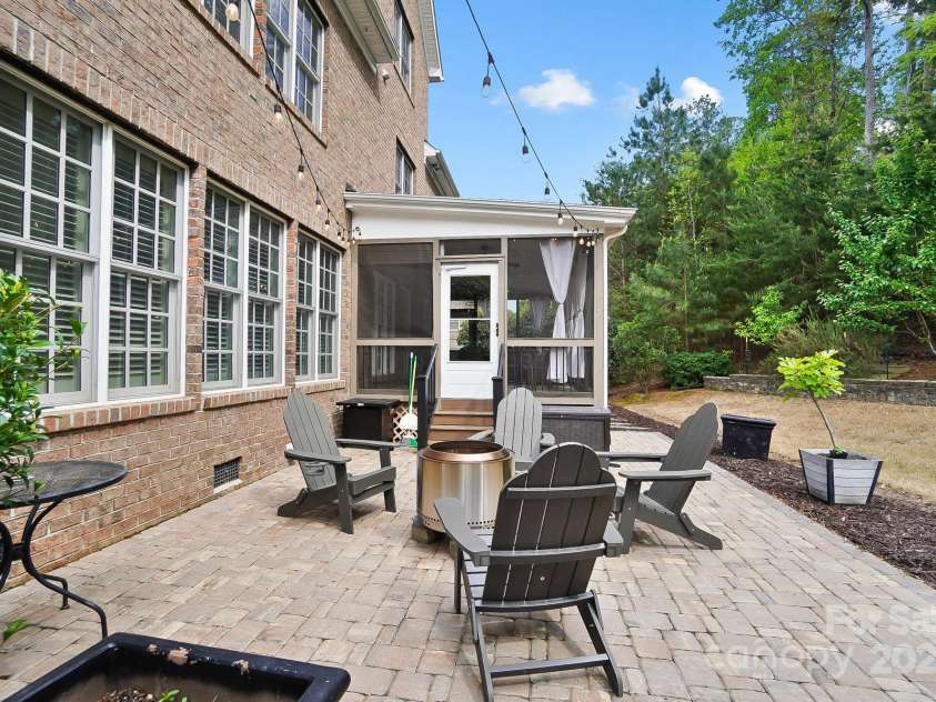 16532 Flintrock Falls Lane, Charlotte, NC 28278.  MLS# CAR4247565, YatesRealty ID 6347. Paver patio enjoys shade in the late afternoons and evenings.