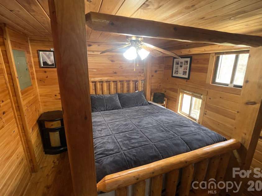 365 Hillbilly Lane, Mill Spring, NC 28756.  MLS# CAR4359500, YatesRealty ID 6349. Amish built bed frame included