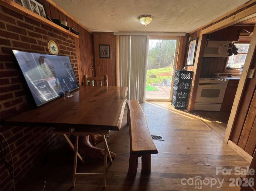 365 Hillbilly Lane, Mill Spring, NC 28756.  MLS# CAR4359500, YatesRealty ID 6349. Amish built table and bench included