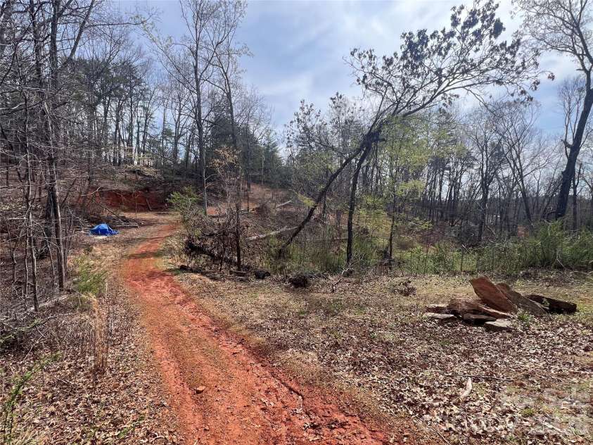 365 Hillbilly Lane, Mill Spring, NC 28756.  MLS# CAR4359500, YatesRealty ID 6349. Potenital build site already has a well.