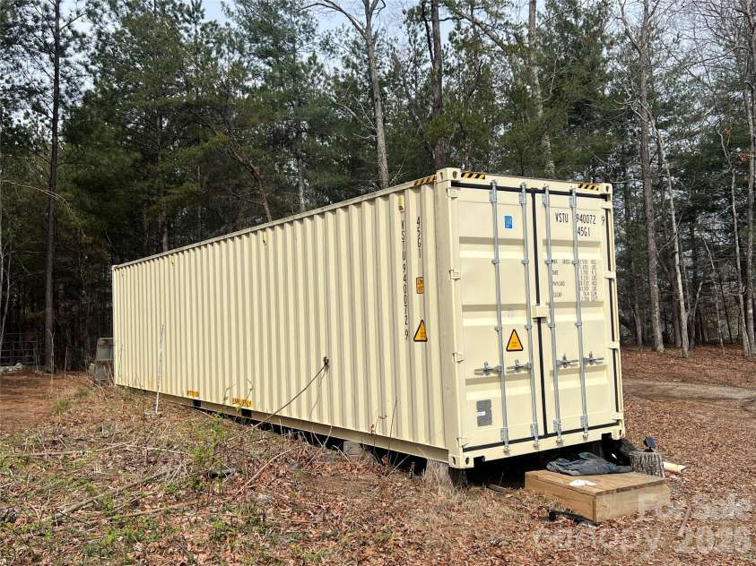 365 Hillbilly Lane, Mill Spring, NC 28756.  MLS# CAR4359500, YatesRealty ID 6349. Shipping container included!