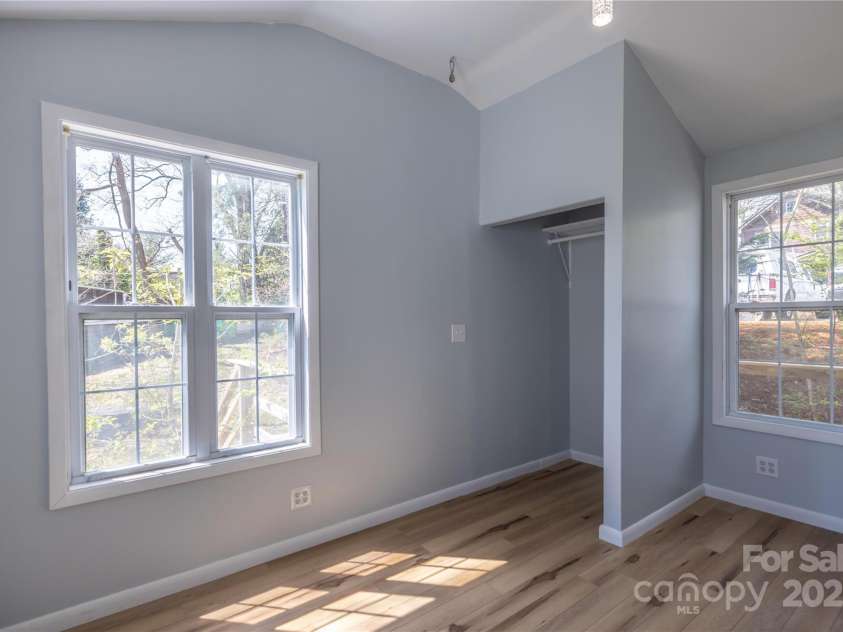 27 W Stewart Street, Asheville, NC 28806.  MLS# CAR4247708, YatesRealty ID 6351. Bedroom 2 Looks Out to the Backyard