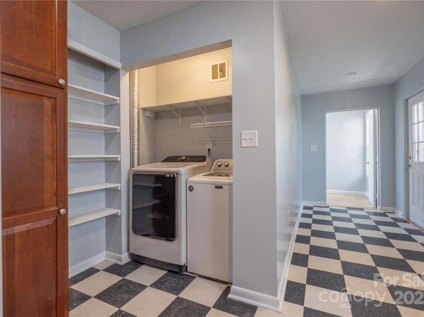27 W Stewart Street, Asheville, NC 28806.  MLS# CAR4247708, YatesRealty ID 6351. Laundry Nook and Pantry Closet