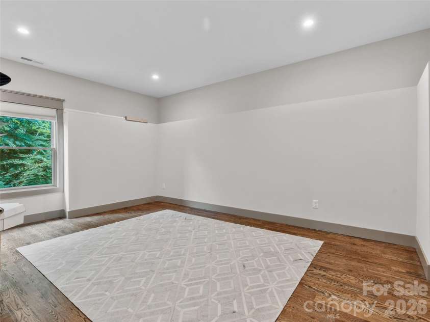 9 Soaring Hawk View, Asheville, NC 28804.  MLS# CAR4351587, YatesRealty ID 6354. Lower: 5th Bedroom or Bonus Room (needs clothes storage)