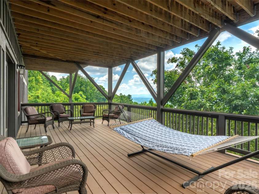 9 Soaring Hawk View, Asheville, NC 28804.  MLS# CAR4351587, YatesRealty ID 6354. Lower: Covered and Screened Deck