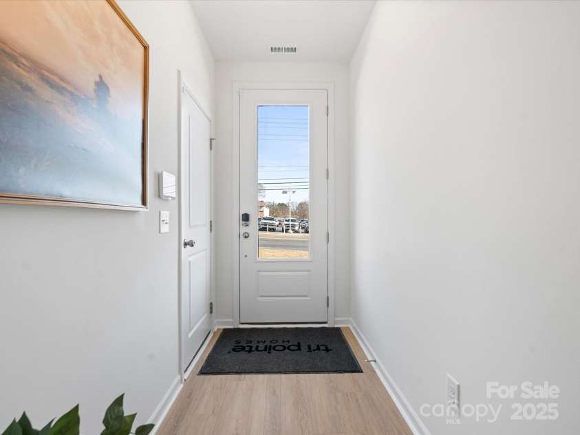 5040 Beirut Drive, Charlotte, NC 28217.  MLS# CAR4330479, YatesRealty ID 6361. 8' Front Doorway.