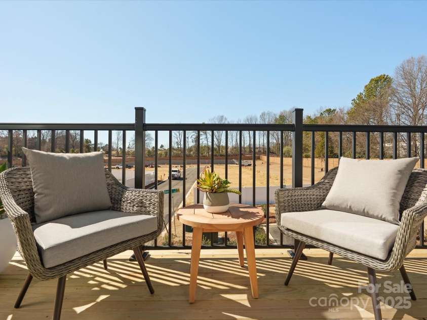 5032 Beirut Drive, Charlotte, NC 28217.  MLS# CAR4330424, YatesRealty ID 6362. Outdoor Living Featuring Modern Black Rail.