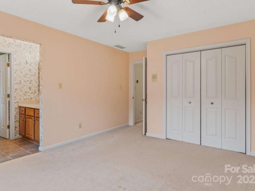 6 Valley Drive, Weaverville, NC 28787.  MLS# CAR4246234, YatesRealty ID 6369. Upstairs room with 