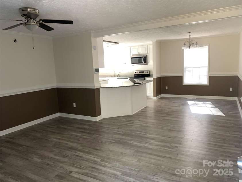 1773 ELLIS Road, Kershaw, SC 29067.  MLS# CAR4314646, YatesRealty ID 637. From living room to dining area and kitchen