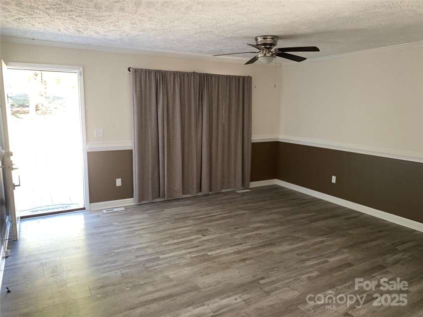 1773 ELLIS Road, Kershaw, SC 29067.  MLS# CAR4314646, YatesRealty ID 637. Front door into living room.