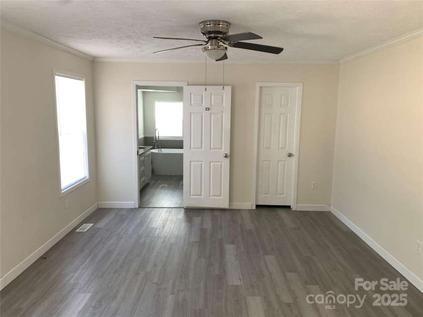 1773 ELLIS Road, Kershaw, SC 29067.  MLS# CAR4314646, YatesRealty ID 637. Primary bedroom with bath and closet