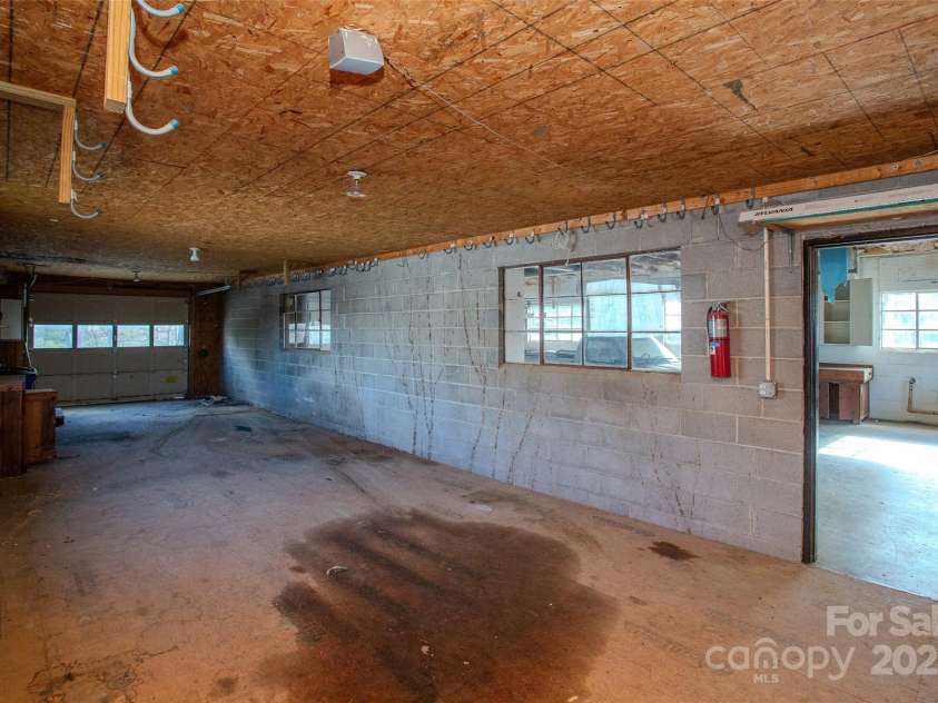 9 Eller Ford Road, Weaverville, NC 28787.  MLS# CAR4203004, YatesRealty ID 6373. 28x14 Storage in garage