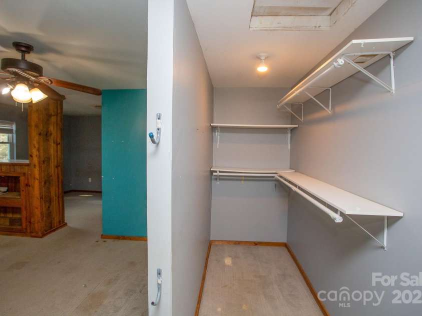 9 Eller Ford Road, Weaverville, NC 28787.  MLS# CAR4203004, YatesRealty ID 6373. Bedroom with large closet