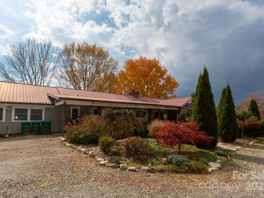 9 Eller Ford Road, Weaverville, NC 28787.  MLS# CAR4203004, YatesRealty ID 6373. Mature landscaping