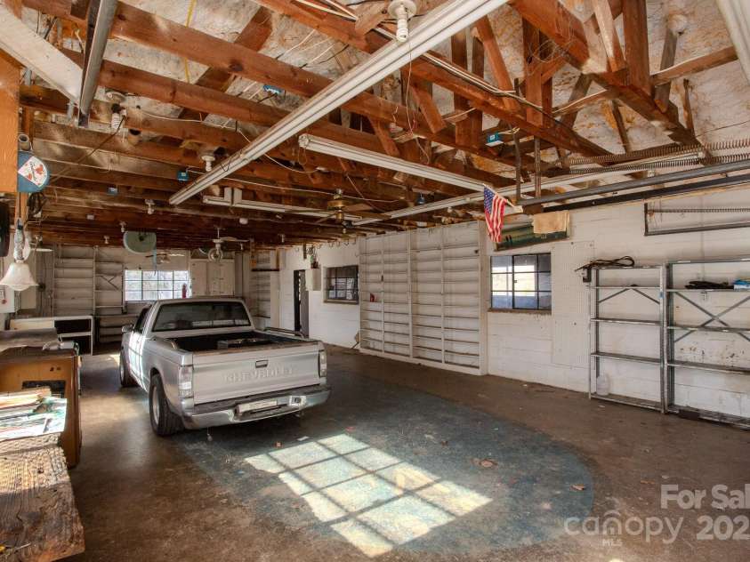 9 Eller Ford Road, Weaverville, NC 28787.  MLS# CAR4203004, YatesRealty ID 6373. Multi-bay garage space