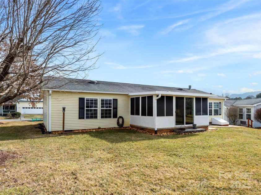 449 Riverwind Drive, Hendersonville, NC 28739.  MLS# CAR4220868, YatesRealty ID 6376. Back View of the Home
