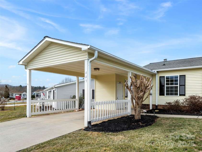 449 Riverwind Drive, Hendersonville, NC 28739.  MLS# CAR4220868, YatesRealty ID 6376. Covered Carport