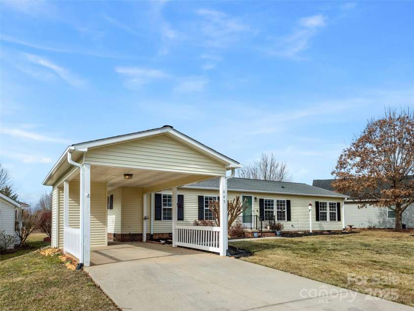 449 Riverwind Drive, Hendersonville, NC 28739.  MLS# CAR4220868, YatesRealty ID 6376. Covered Carport