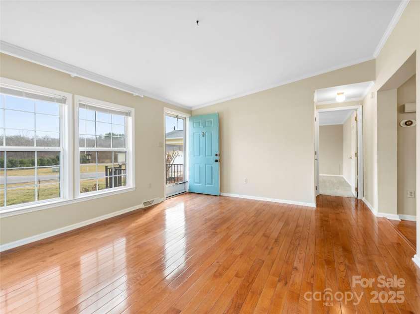 449 Riverwind Drive, Hendersonville, NC 28739.  MLS# CAR4220868, YatesRealty ID 6376. Front Entrance and Inviting Living Room