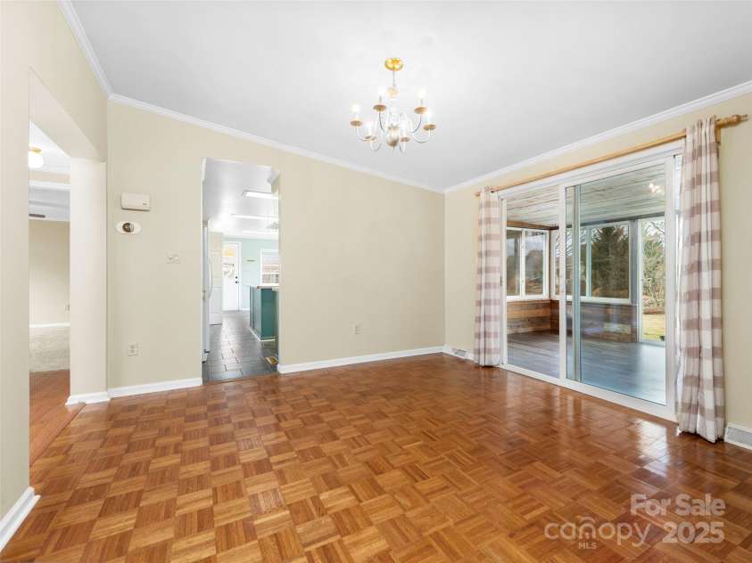 449 Riverwind Drive, Hendersonville, NC 28739.  MLS# CAR4220868, YatesRealty ID 6376. Parquet Wood Floors in the Dining Room