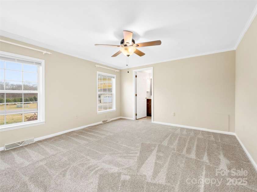 449 Riverwind Drive, Hendersonville, NC 28739.  MLS# CAR4220868, YatesRealty ID 6376. Primary Bedroom