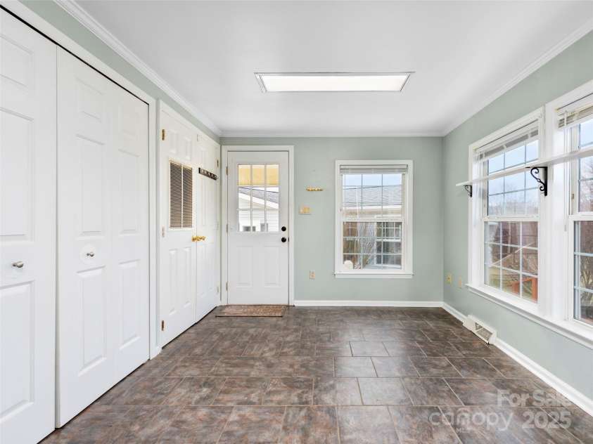 449 Riverwind Drive, Hendersonville, NC 28739.  MLS# CAR4220868, YatesRealty ID 6376. Side Entrance Into the Kitchen