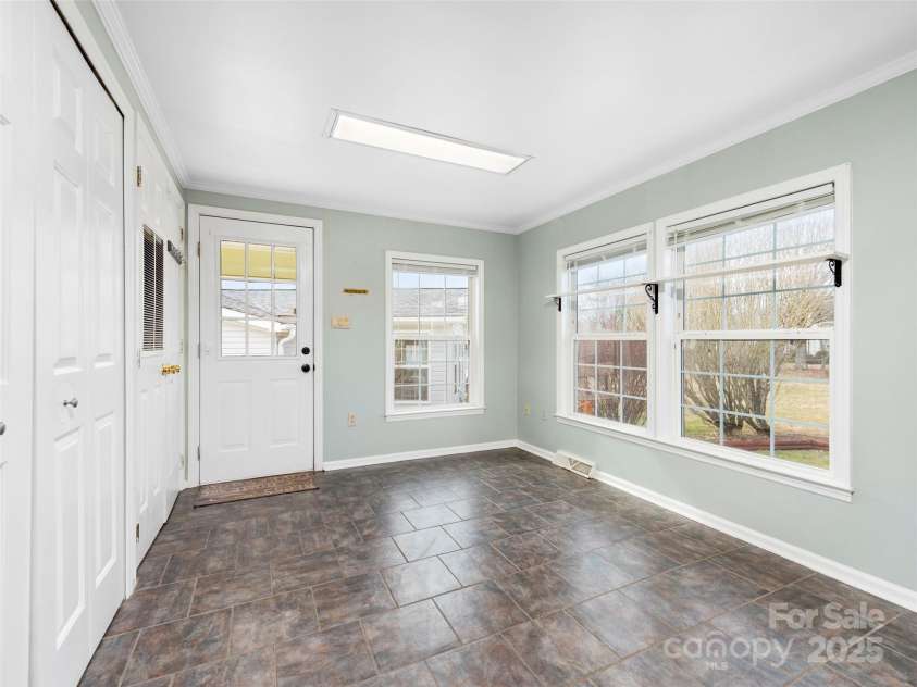 449 Riverwind Drive, Hendersonville, NC 28739.  MLS# CAR4220868, YatesRealty ID 6376. Spacious Kitchen Dining Area