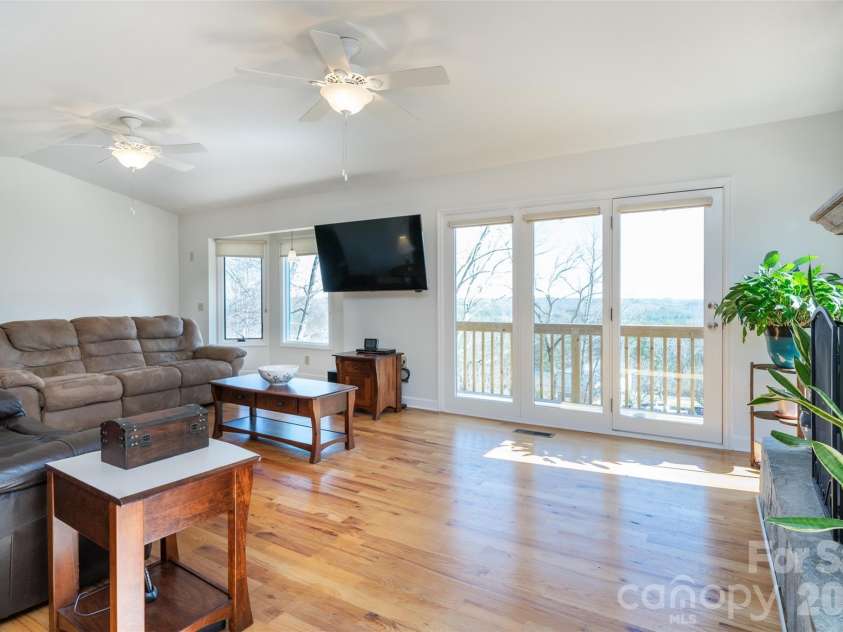 344 Hague Drive, Columbus, NC 28722.  MLS# CAR4350359, YatesRealty ID 6377. Large living room with long range views