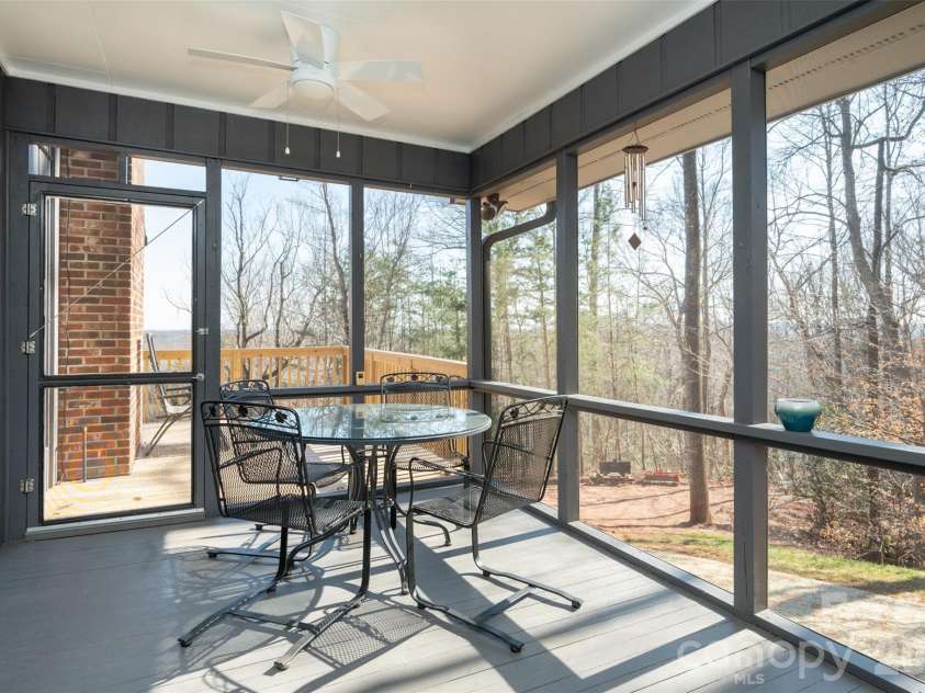 344 Hague Drive, Columbus, NC 28722.  MLS# CAR4350359, YatesRealty ID 6377. Screen porch off dining area
