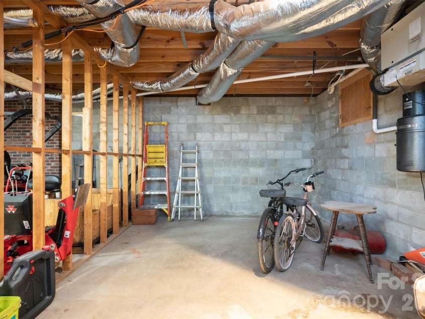 344 Hague Drive, Columbus, NC 28722.  MLS# CAR4350359, YatesRealty ID 6377. Unfinished basement area is heated /cooled