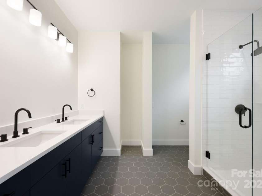 13 Crestfield Avenue, Woodfin, NC 28804.  MLS# CAR4222543, YatesRealty ID 6380. Ensuite Bathroom