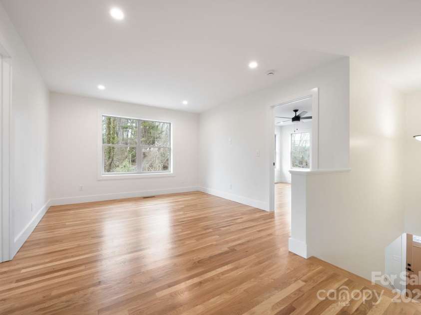 13 Crestfield Avenue, Woodfin, NC 28804.  MLS# CAR4222543, YatesRealty ID 6380. Lounge Area Upstairs