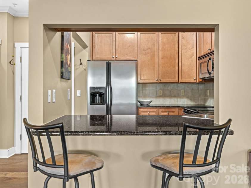 9 Kenilworth Knoll, Asheville, NC 28805.  MLS# CAR4357056, YatesRealty ID 6380. Existing barstools