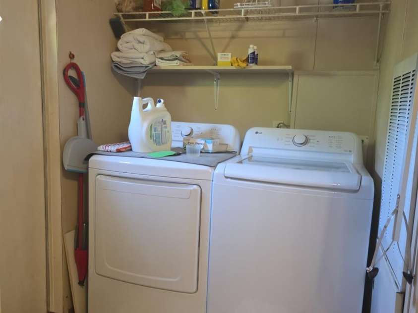 927 Miles Road, Jefferson, SC 29718.  MLS# CAR4247335, YatesRealty ID 6385. Laundry with back door access to the rear deck