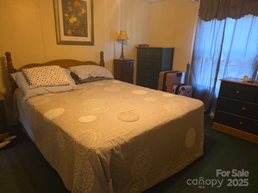 927 Miles Road, Jefferson, SC 29718.  MLS# CAR4247335, YatesRealty ID 6385. Primary bedroom off the living room