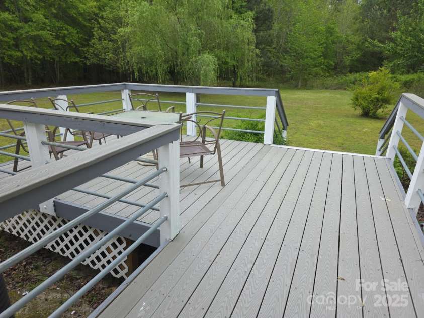 927 Miles Road, Jefferson, SC 29718.  MLS# CAR4247335, YatesRealty ID 6385. Rear deck
